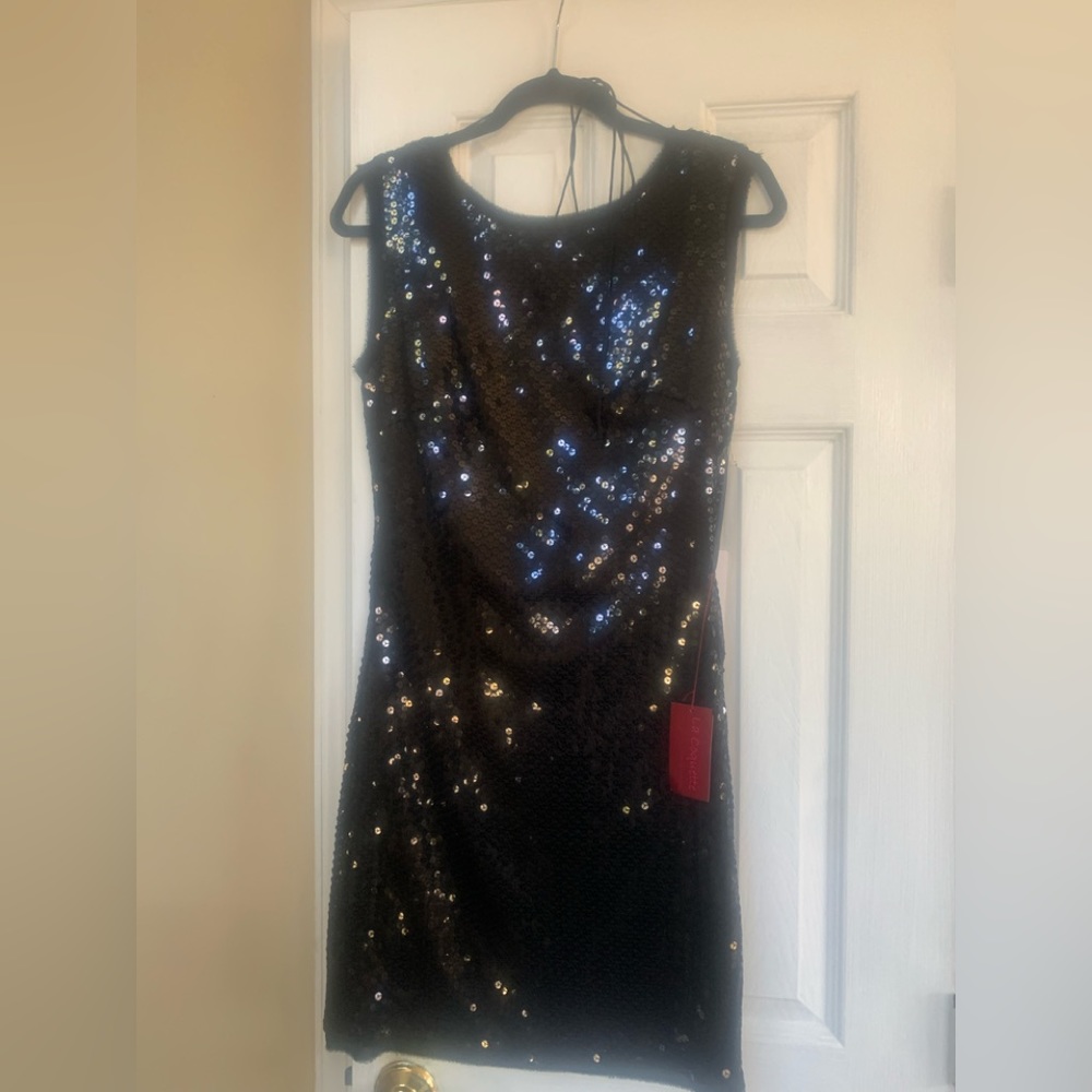 Hot black sequined dress with low tie back NWT